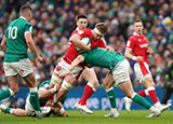 Aaron Wainwright is tackled by Ireland players in 2022 Six Nations