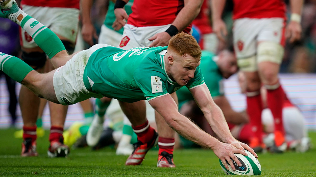 Ciaran Frawley scores a try for Ireland v Wales in 2024 Six Nations