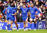 Damian Penaud celebrates scoring a try for France against Scotland in 2022 Six Nations