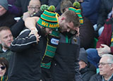 Dan Biggar is helped off the field during Northampton Saints v Saracens match