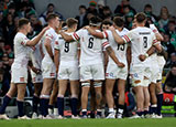 England players gather in huddle during match against Ireland in 2023 Six Nations