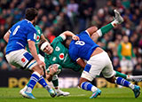 Garry Ringrose is tackled during the Ireland v Italy match in 2022 Six Nations