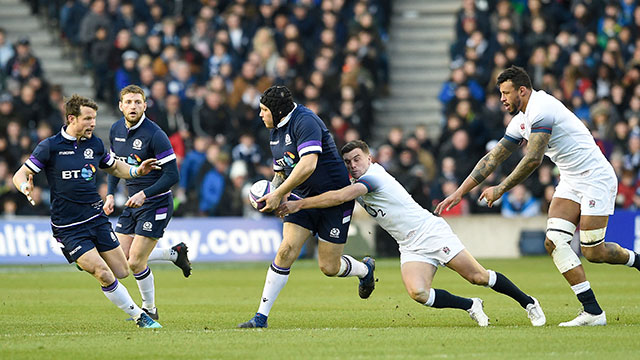 George Ford tackles Gordon Reid during the Scotland v England match in 2018 Six Nations
