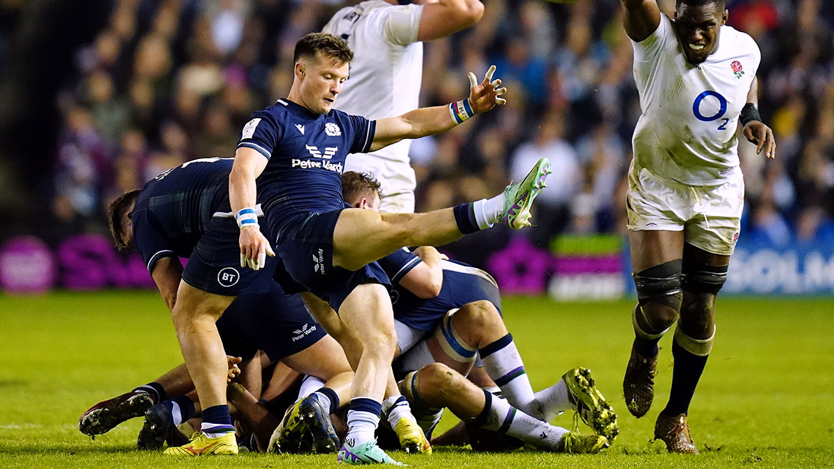 George Horne kicks the ball during Scotland v England match in 2024 Six Nations