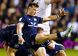 George Horne kicks the ball during Scotland v England match in 2024 Six Nations