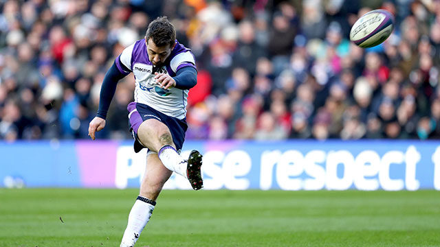 Greig Laidlaw kicks a conversion for Scotland against France