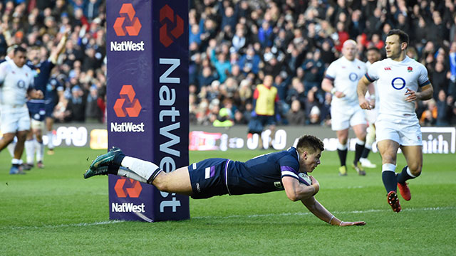 Huw Jones scores a try against England in Calcutta Cup match