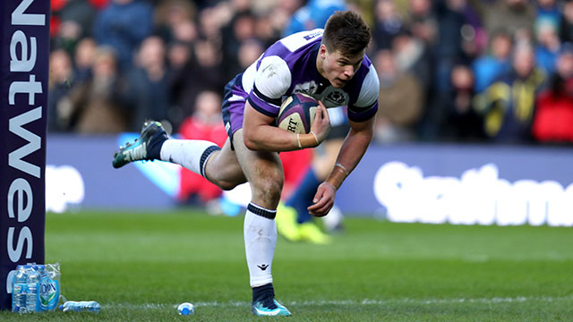 Huw Jones scores a try for Scotland against Italy