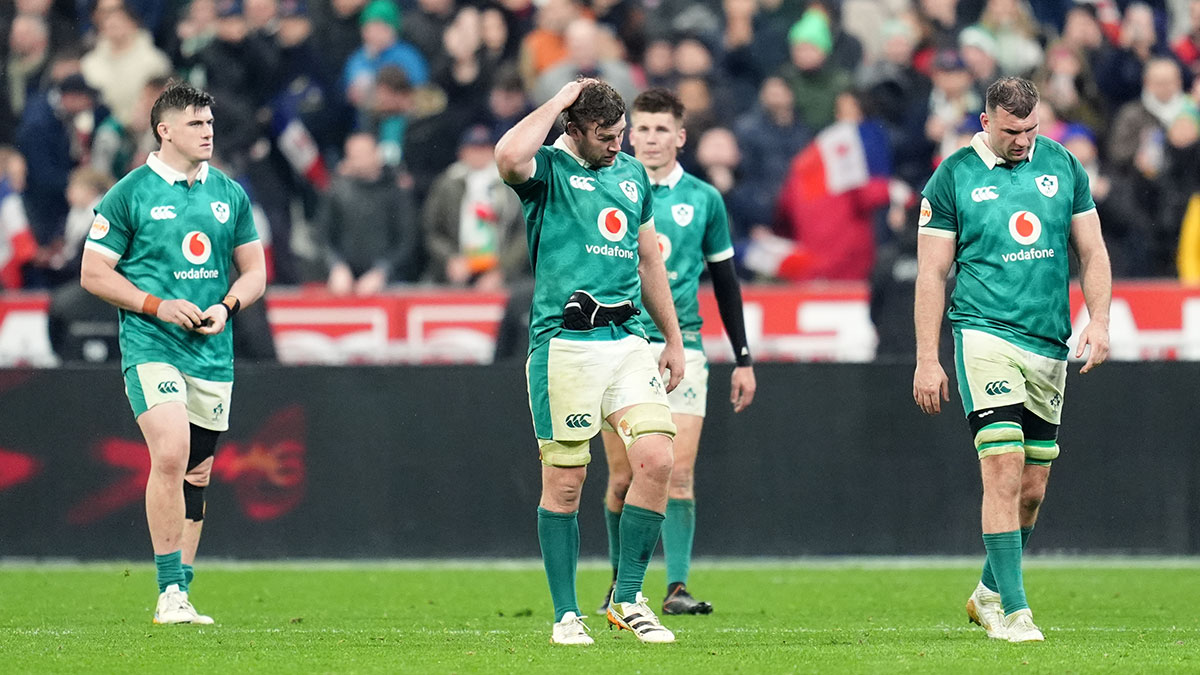 Ireland players look dejected after defeat to France in 2026 Six Nations