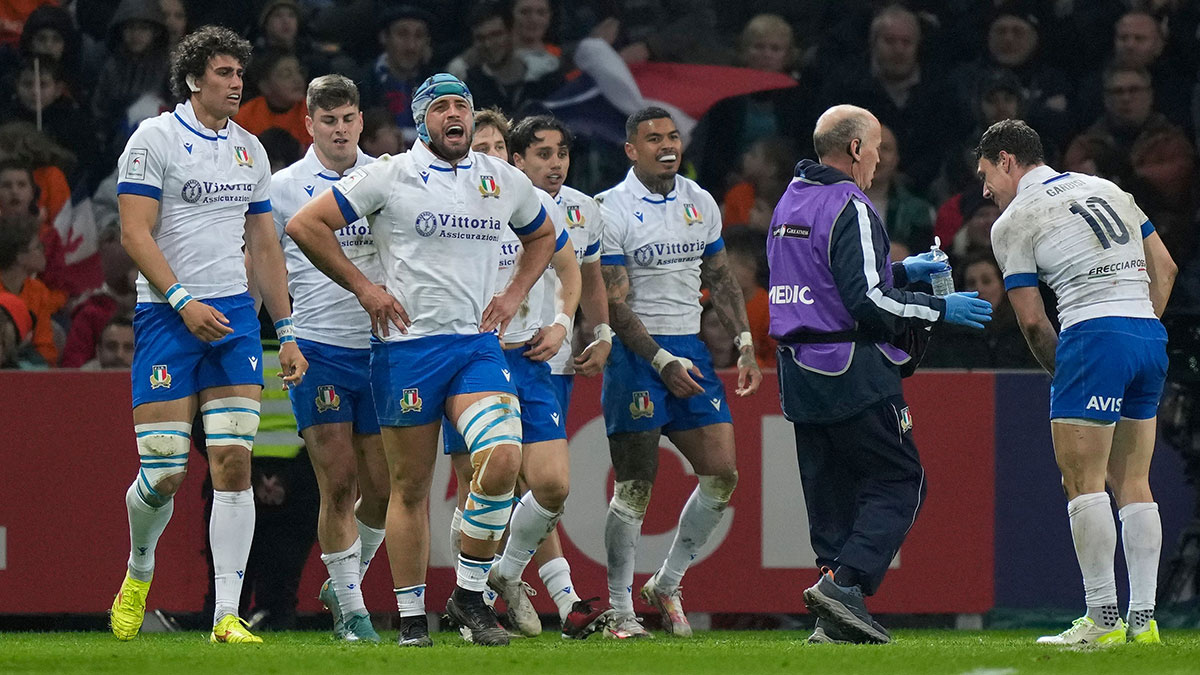 Italy players celebrate try against France in 2024 Six Nations