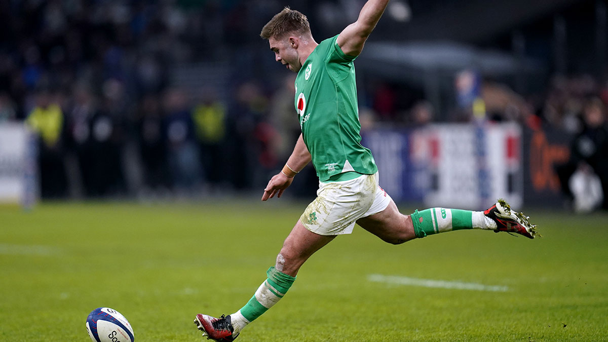 Jack Crowley kicks for Ireland in match against France during 2024 Six Nations