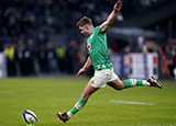 Jack Crowley kicks for Ireland in match against France during 2024 Six Nations