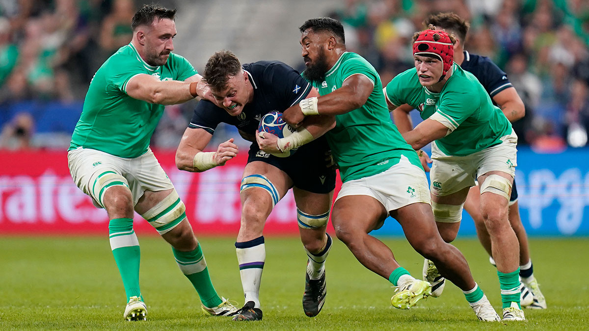Jack Dempsey is tackled during Ireland v Scotland match at 2023 Rugby World Cup