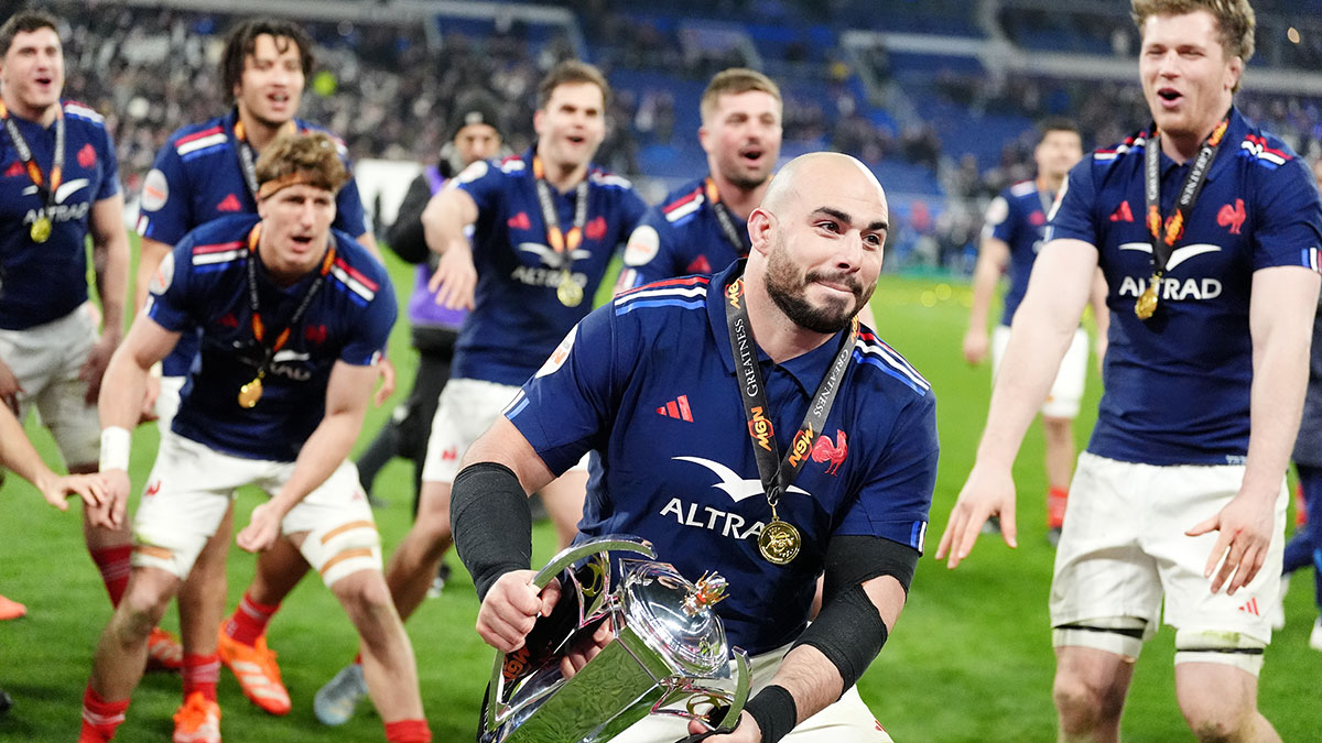 Jean-Baptiste Gros celebrates with trophy in 2025 Six Nations