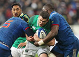 Johnny Sexton is tackled during the France v Ireland match in 2018 Six Nations