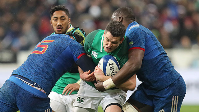 Johnny Sexton is tackled during the France v Ireland match in 2018 Six Nations