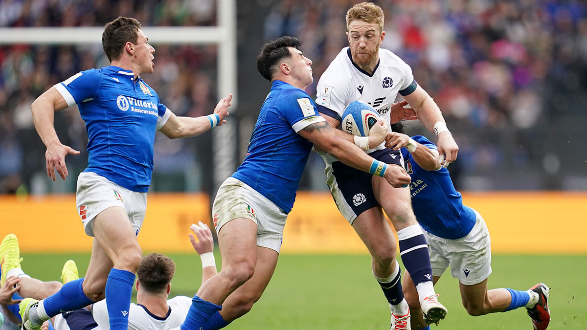 Kyle Steyn is tackled during Italy v Scotland match in 2024 Six Nations
