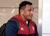 Mako Vunipola with England Rugby team on return to Heathrow Airport