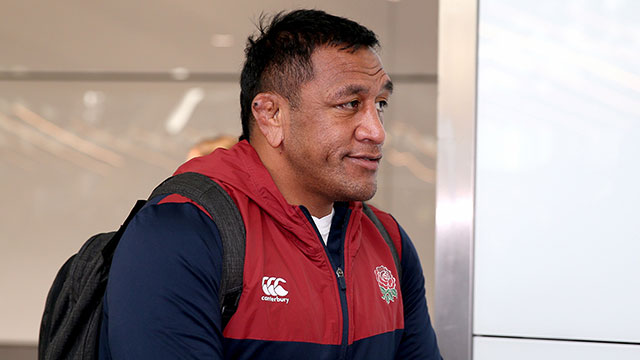 Mako Vunipola with England Rugby team on return to Heathrow Airport