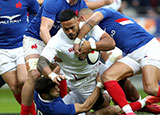 Manu Tuilagi is tackled by French players during France v England in 2020 Six Nations