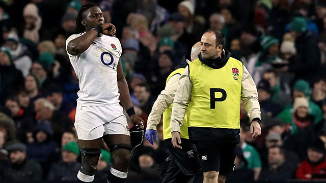 Maro Itoje leaves the pitch with an injury during the Ireland v England match