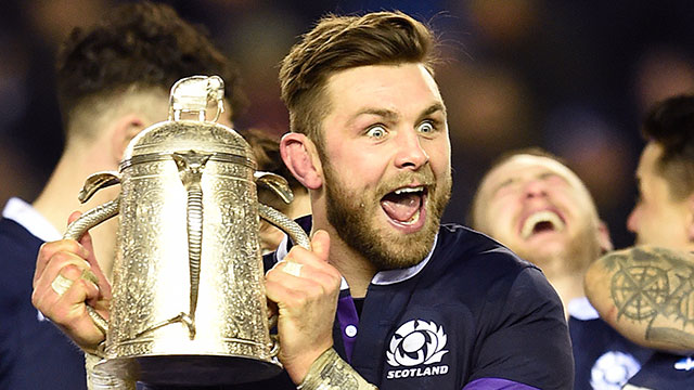 Ryan Wilson celebrates with Calcutta Cup