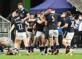 Scotland players celebrate victory over France in 2021 Six Nations