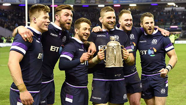 Scotland players celebrate with Calcutta Cup