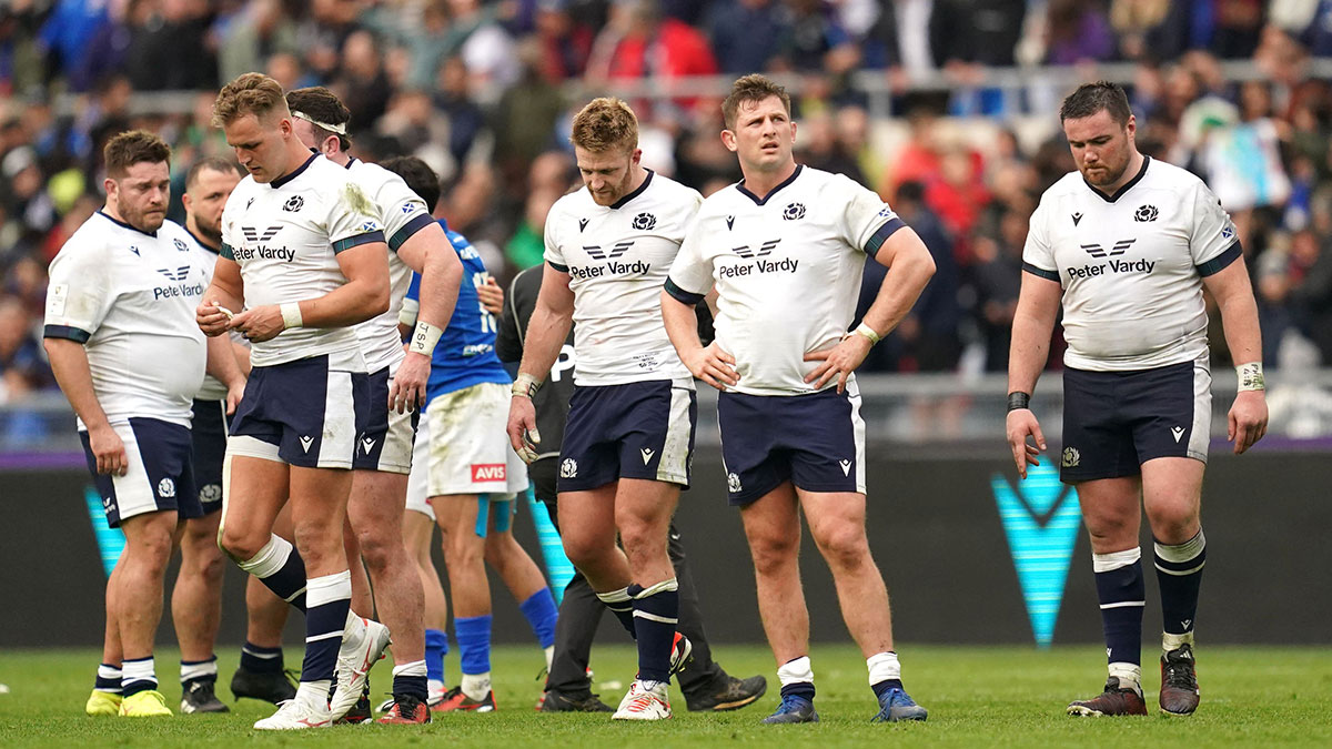 Scotland players look dejected after loss to Italy in 2024 Six Nations 