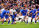 Stuart Hogg is tackled during Scotland v France match in 2022 Six Nations