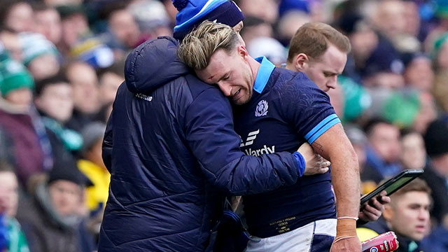 Stuart Hogg leaves the field injured during Scotland v Ireland match in 2023 Six Nations