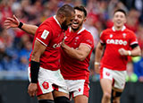 Taulupe Faletau celebrates with Rhys Webb after scoring a try for Wales against Italy in 2023 Six Nations