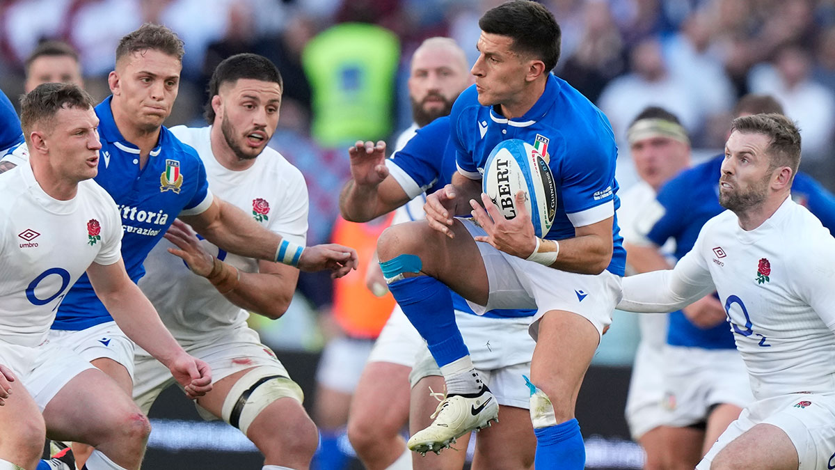 Tommaso Allan takes a high ball against England in 2024 Six Nations
