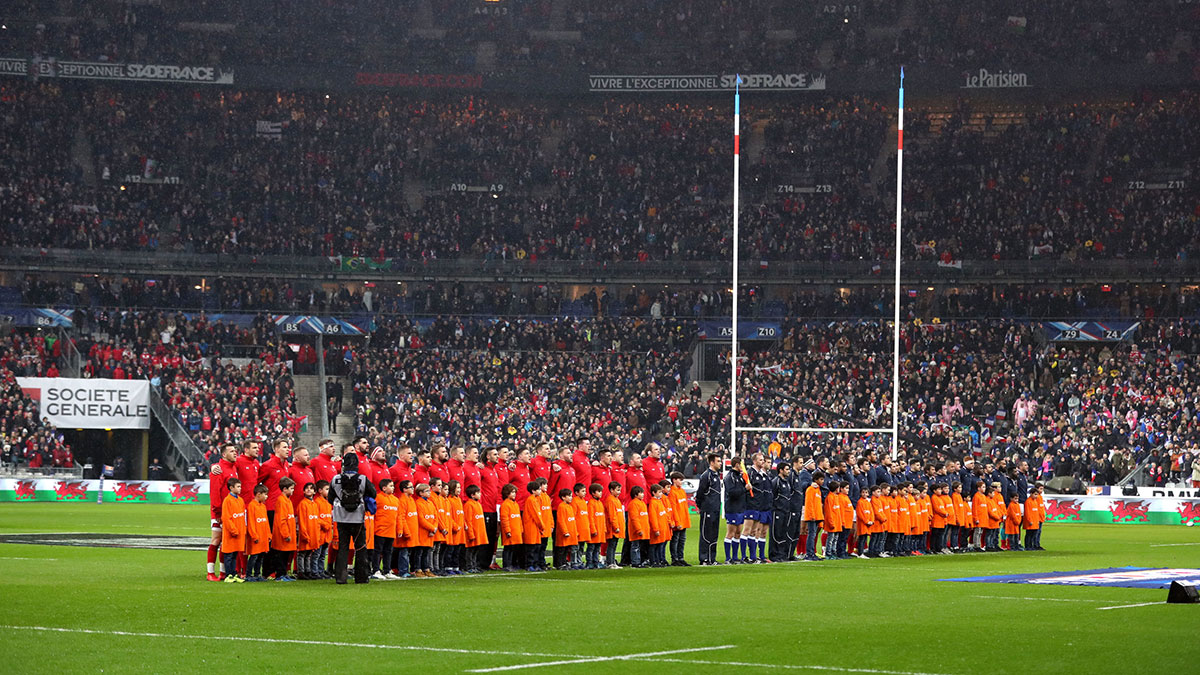 Wales and France players line up before Friday night match in 2019 Six Nations