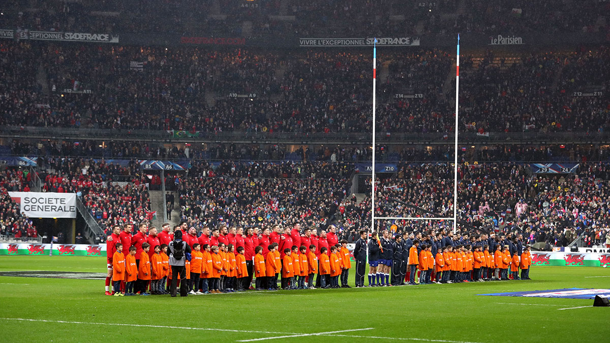 Wales and France players line up before Friday night match in 2019 Six Nations