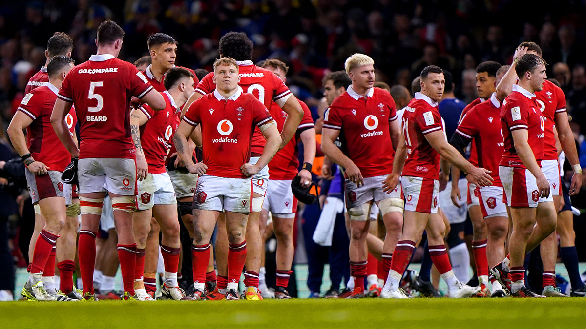 Wales players look dejected after loss to France in 2024 Six Nations 